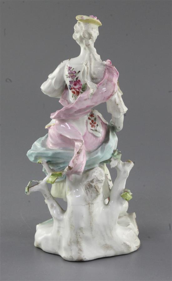 A Derby group of a Shepherdess and a sheep, c. 1760, h. 26.5cm, slight restoration